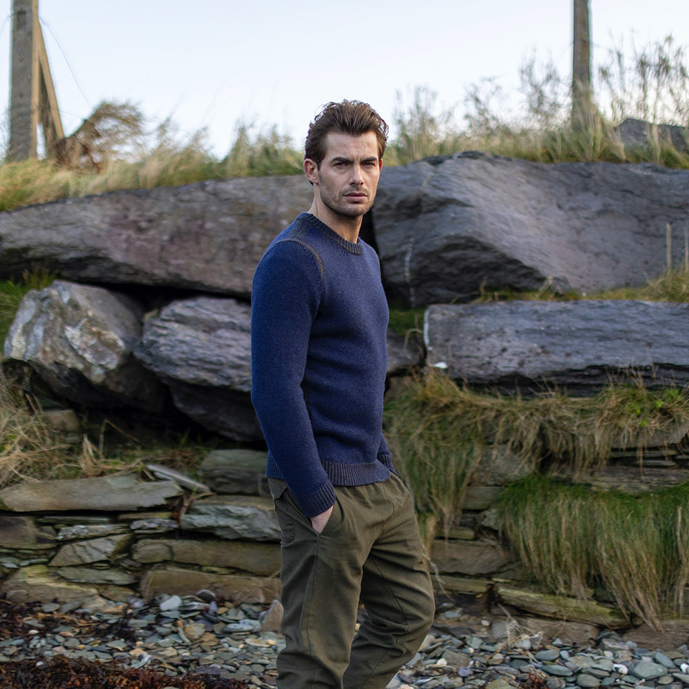 IDH Fisherman sweater on man, side view