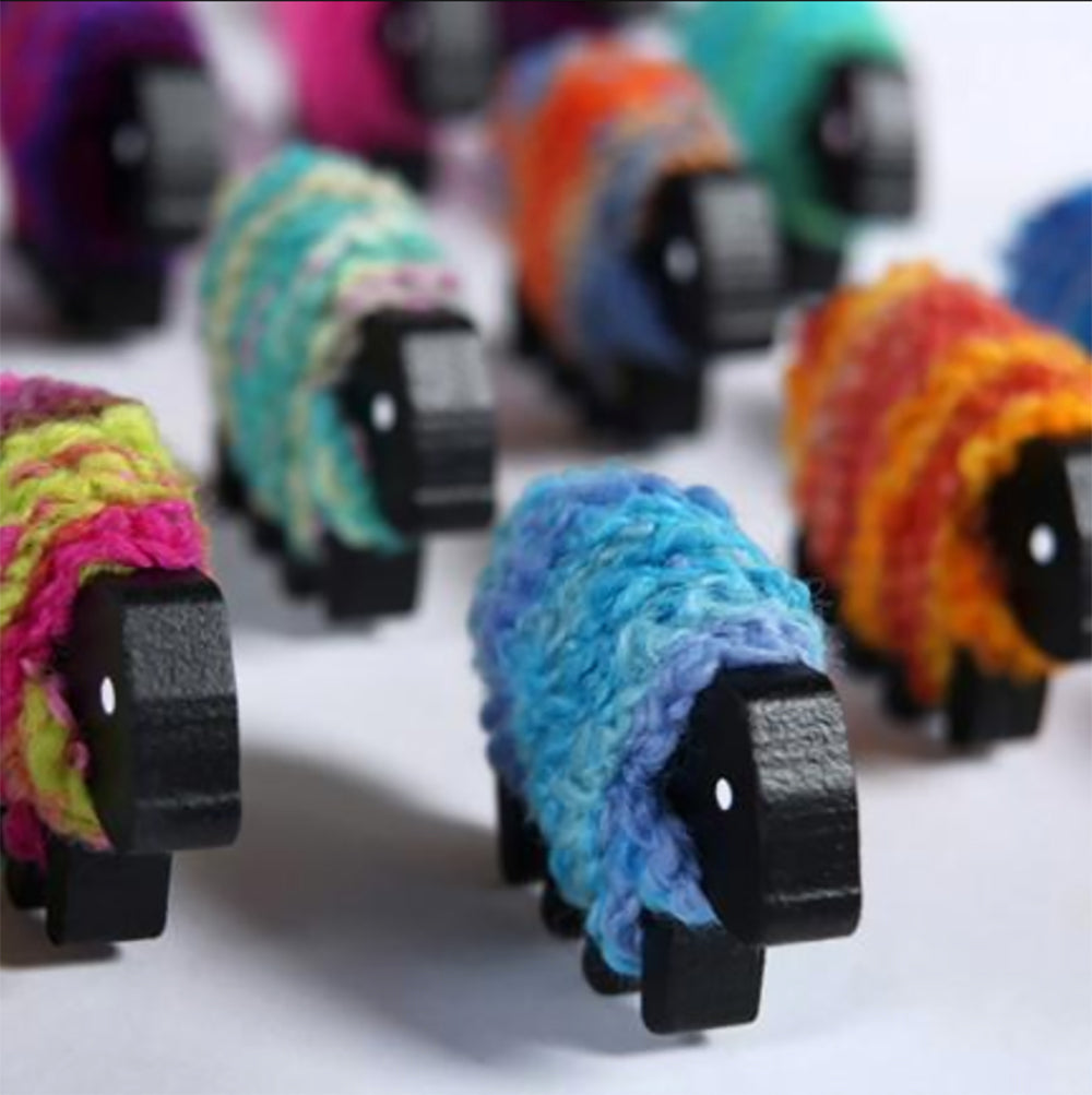 Colorful yarn sheep figurines