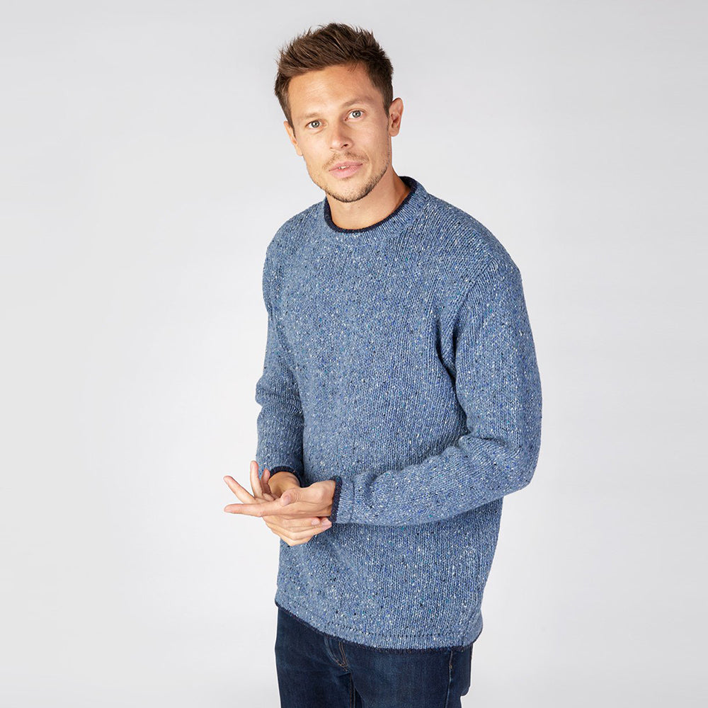 Man wearing Roundstone sweater in Blue Ocean