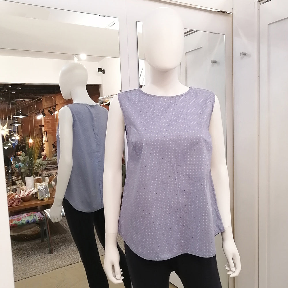 Blue cotton polka dot top on mannequin
