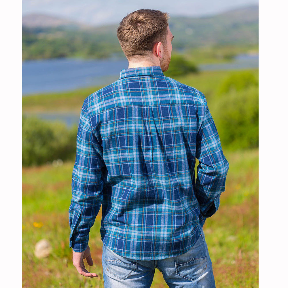 Man wearing blue flannel shirt, back view