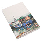Early morning harbor scene on a notebook cover