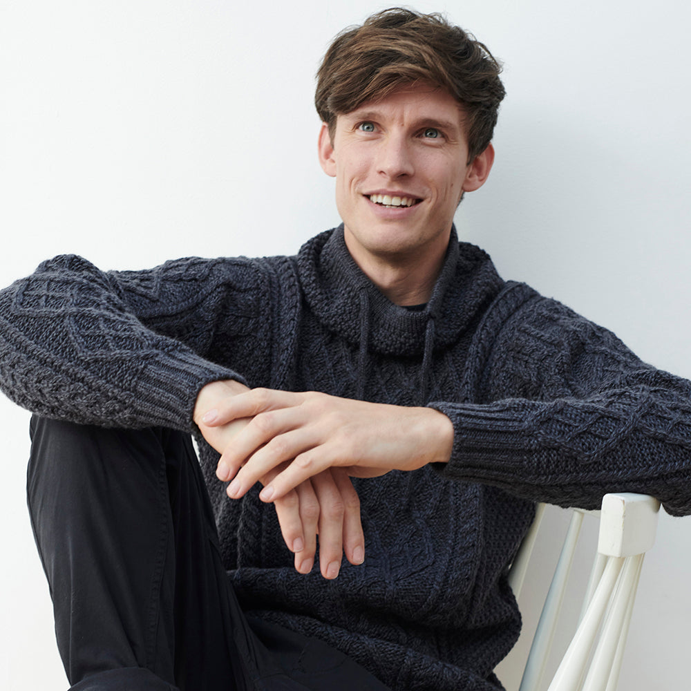 Man in gray drawstring neck sweater