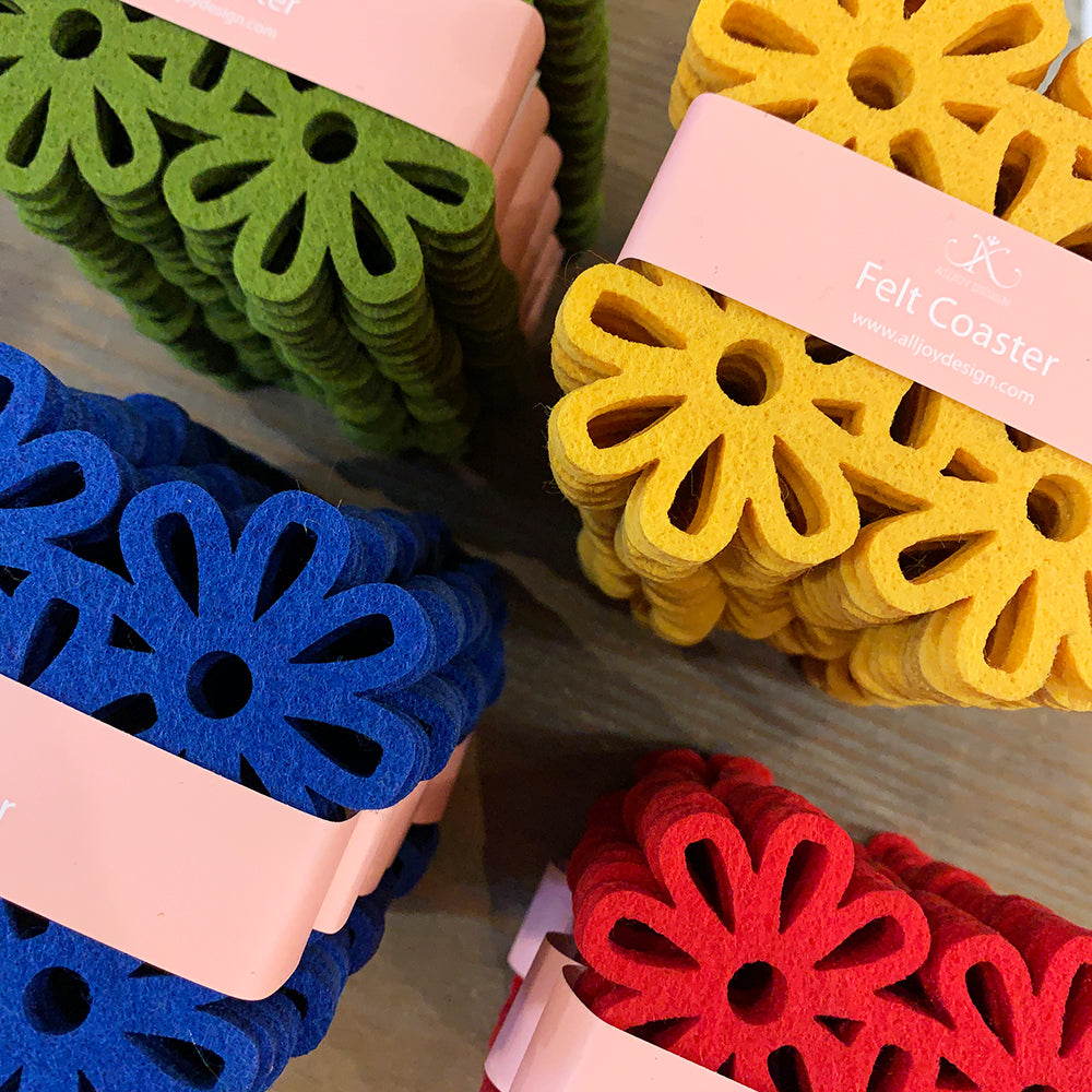 Closeup of colorful felt flower coasters