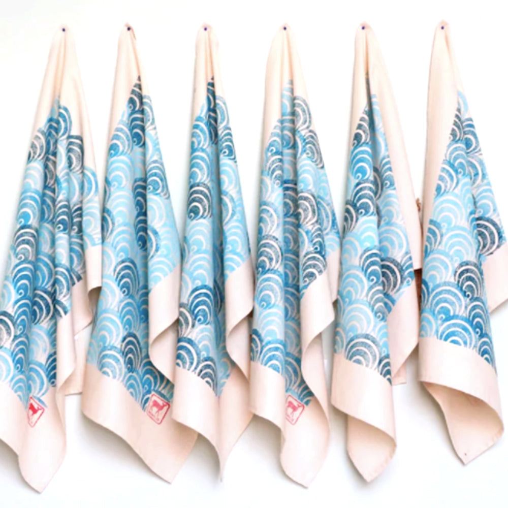 Blue wave pattern tea towels hanging