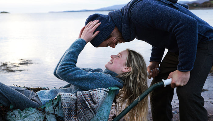 Couple in Fisherman Out Of Ireland Sweaters 