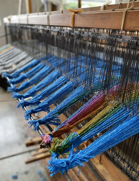 wool yarns on a loom
