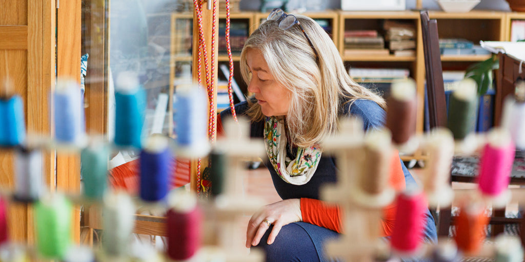 Artist Working In Her Studio Creating Textiles For Irish Design House 