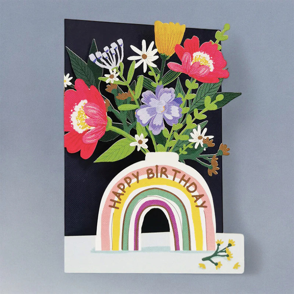 Floral bouquet in rainbow vase