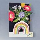 Floral bouquet in rainbow vase