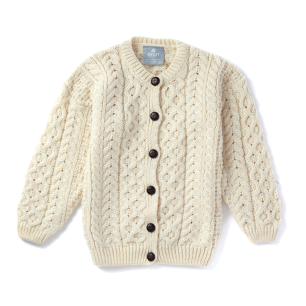 Kids Aran cream cardigan with buttons, full front view.