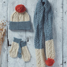 Kids cream and blue hat, scarf, and mitten set