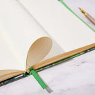 IDH Cactus journal open with pen and bookmark