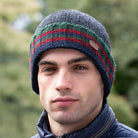 Charcoal green ribbed knit turn-up hat on man