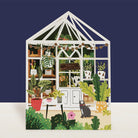 Greenhouse with plants and cat