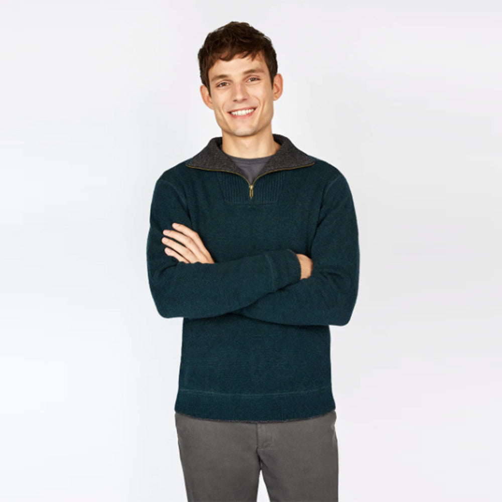 Man wearing Ireland's Eye Pine Green half-zip sweater