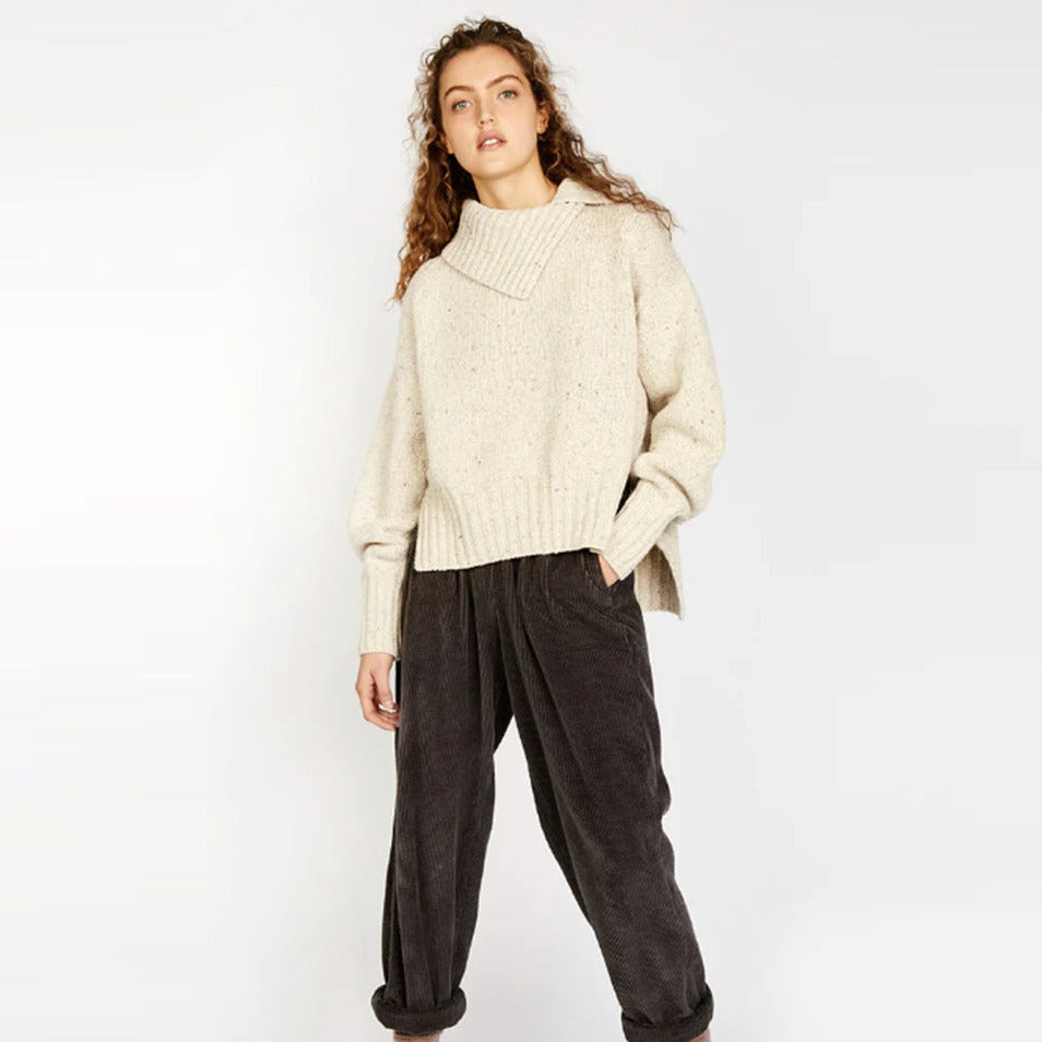 Woman wearing IDH Ireland's Eye Chalk Wilde Funnel Neck Sweater