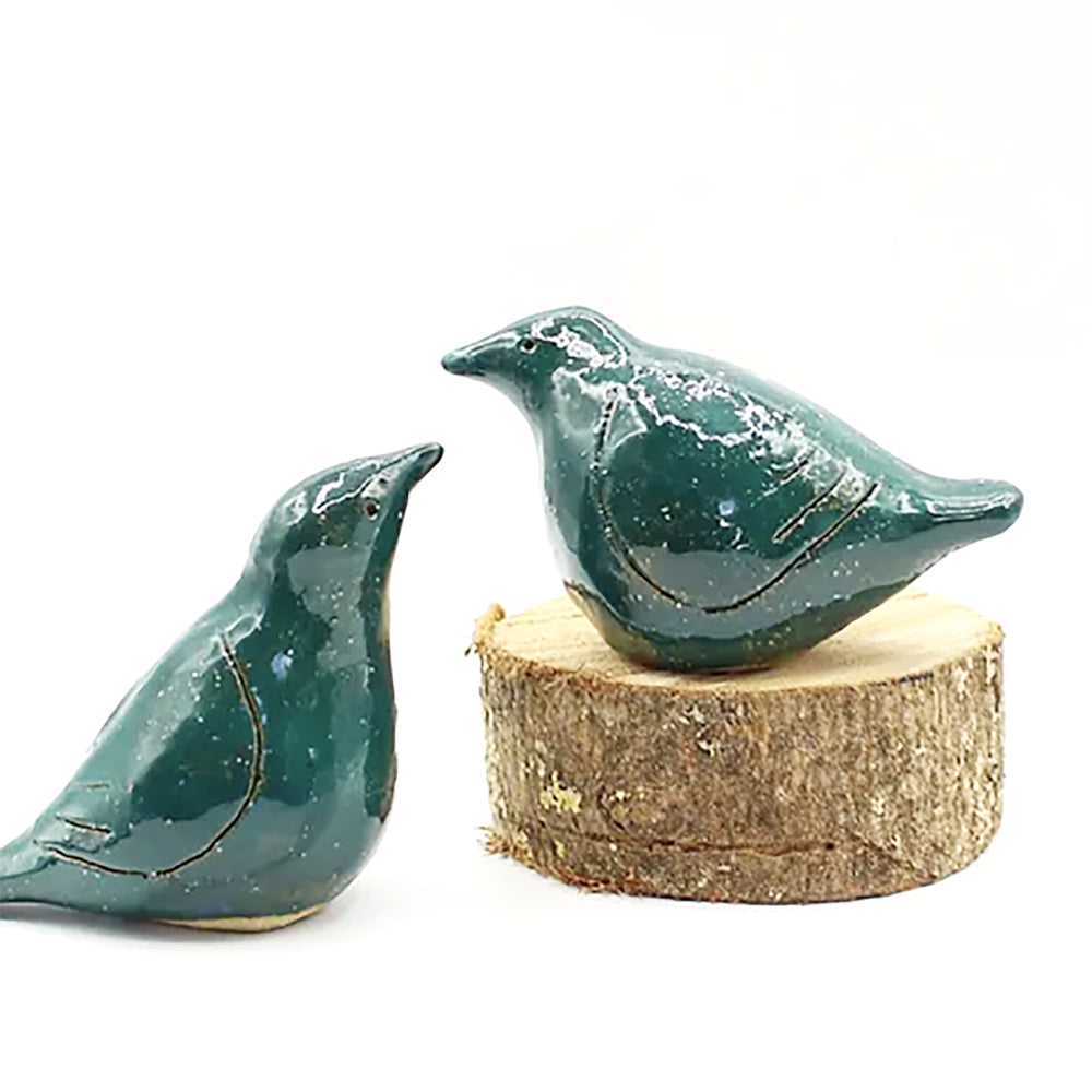 Anita Reynolds teal lovebird sculptures