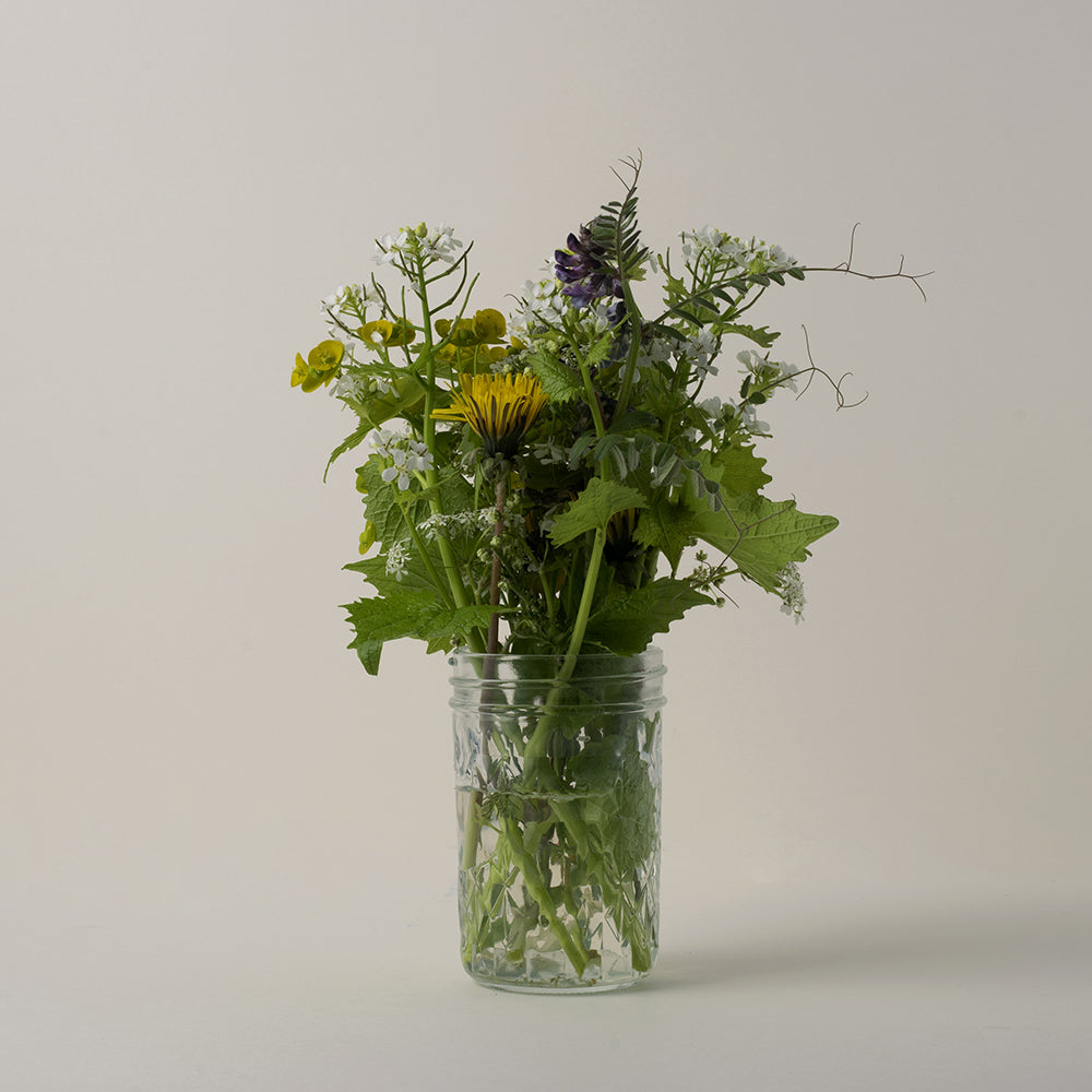 Wildflowers in a square jam jar