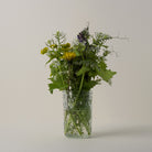 Wildflowers in a square jam jar