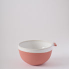 Red ceramic bowl with handle