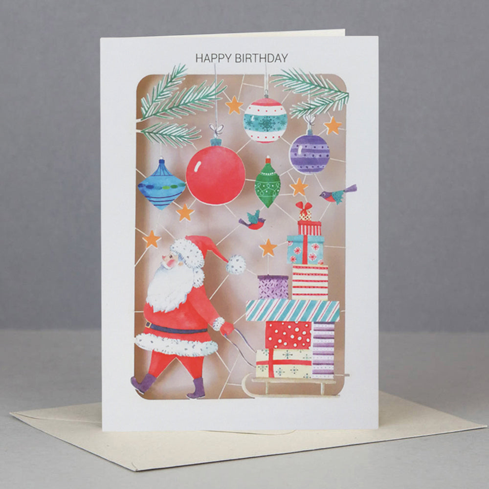Santa birthday card with ornaments and presents