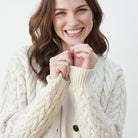 Woman in Cream Aran Lumber Crew Neck Sweater
