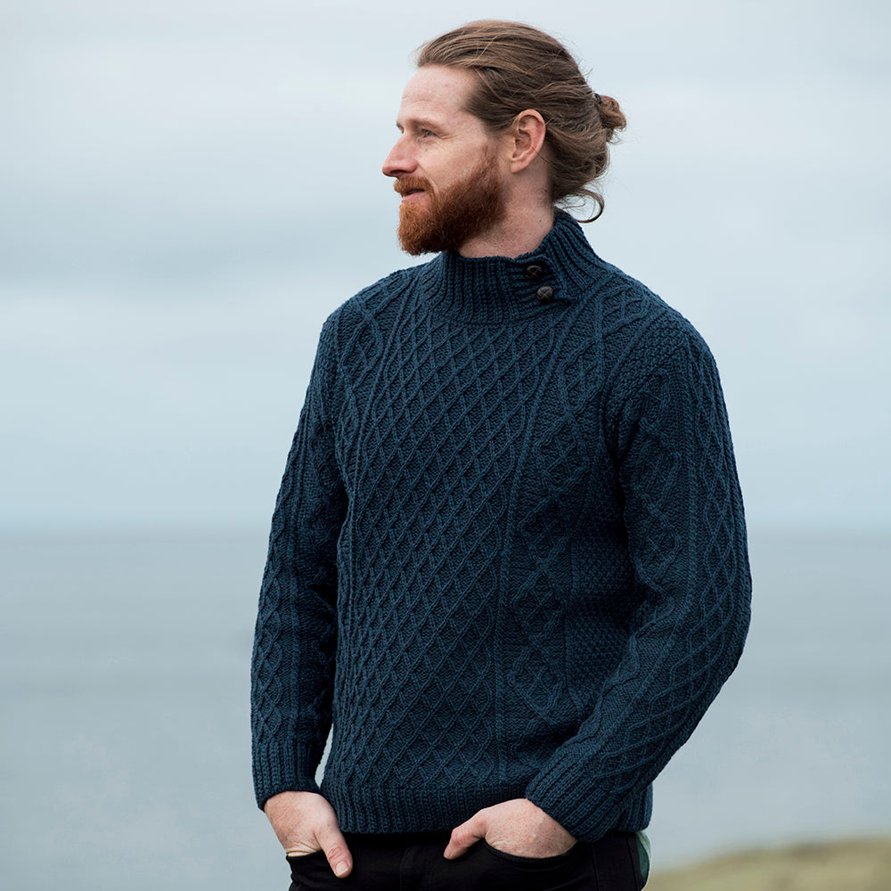 Man in green aran sweater with button collar