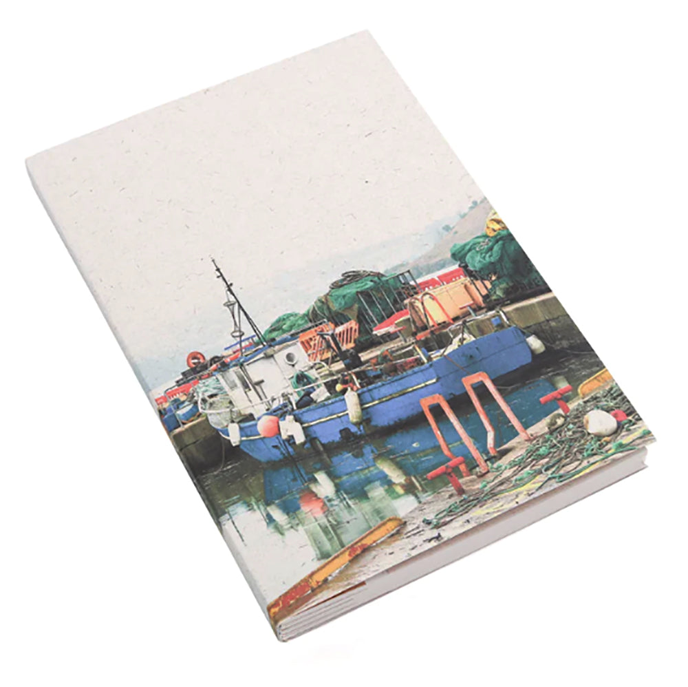 Early morning harbor scene on a notebook cover