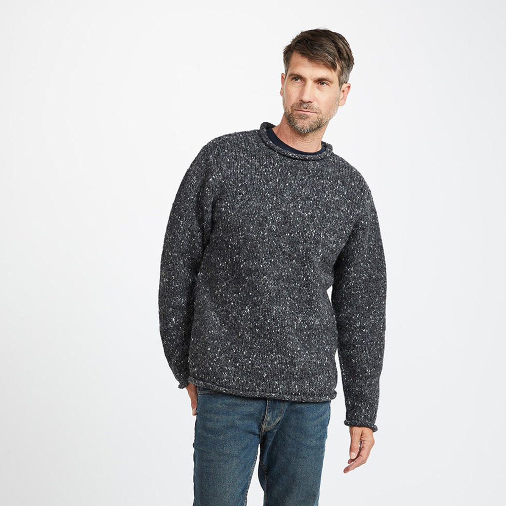 Man in Charcoal Donegal Tweed Roll Neck Sweater