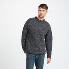 Man in Charcoal Donegal Tweed Roll Neck Sweater