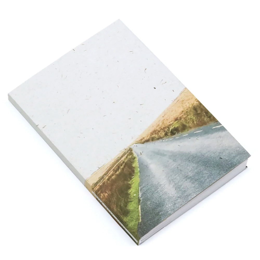 Notebook with road image on cover
