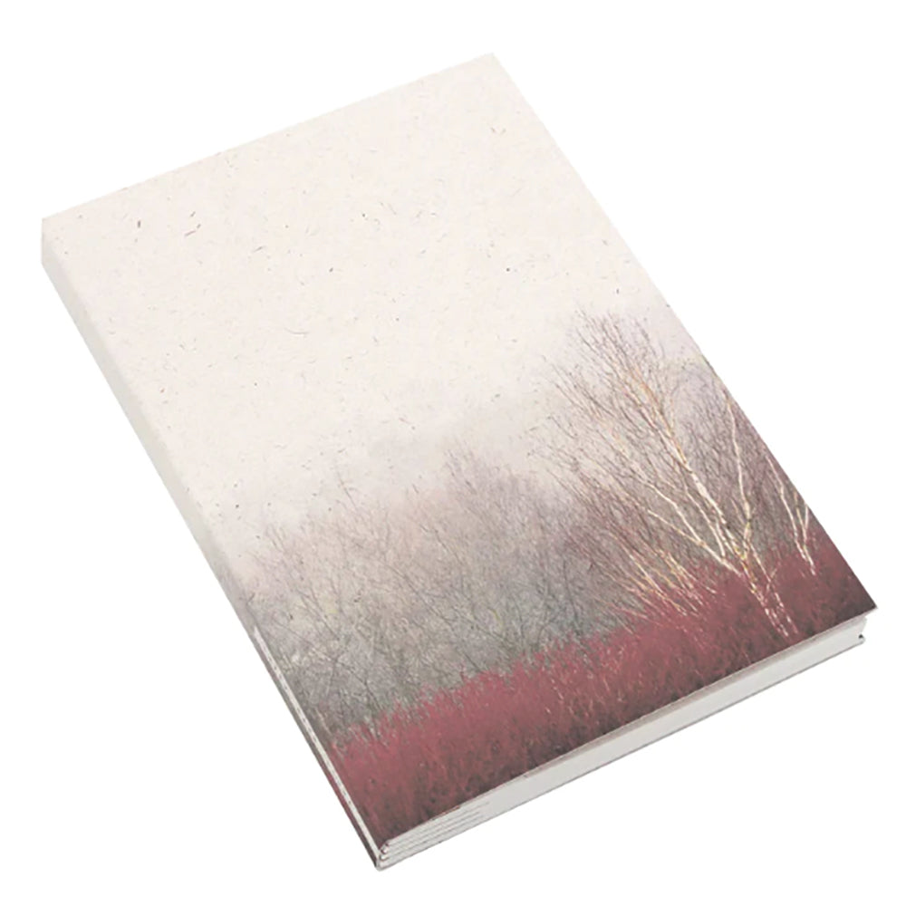 landscape with trees and red field