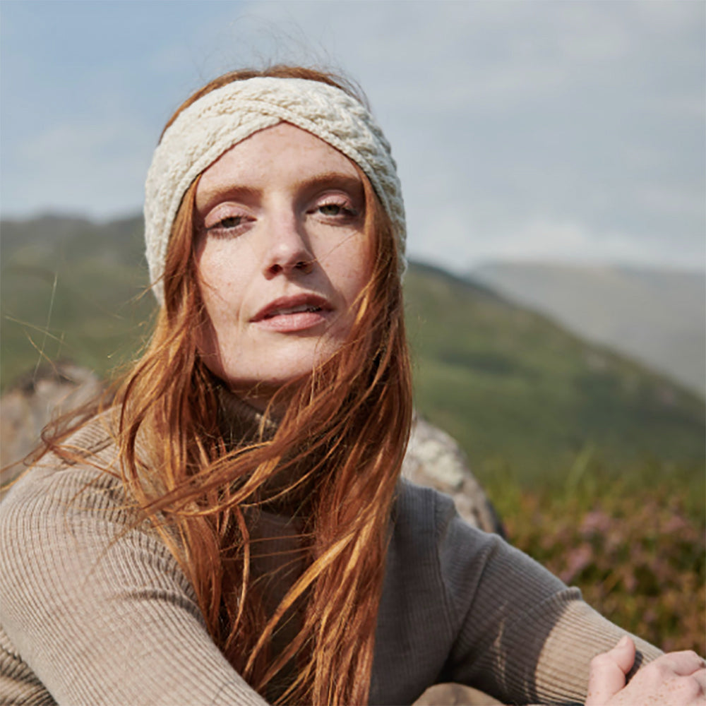 Woman wearing twist knit headband