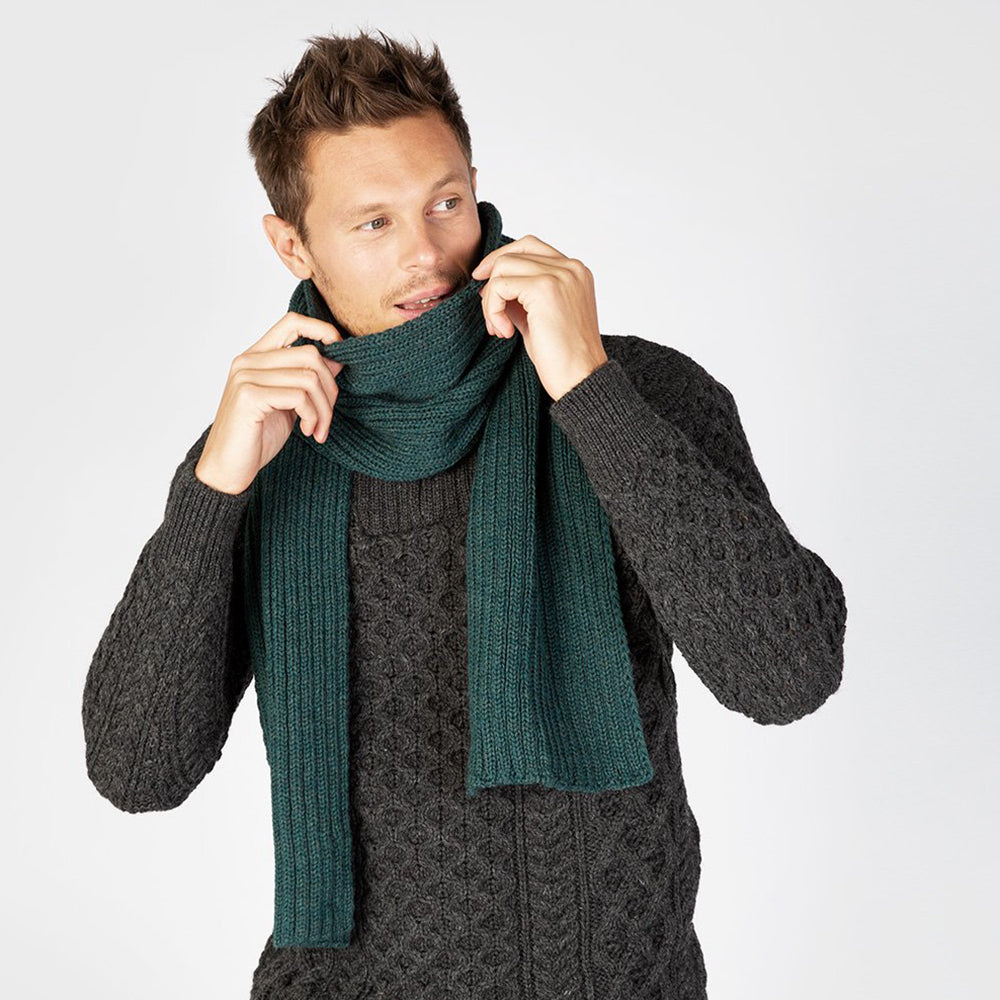 Man wearing square evergreen scarf