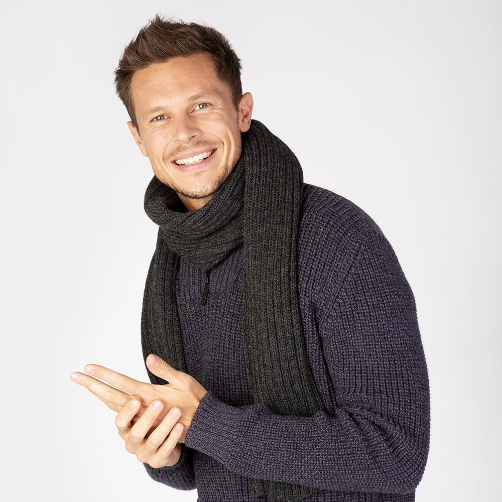 Man wearing graphite scarf and sweater
