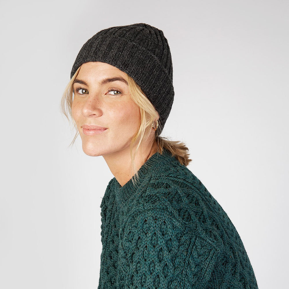 Woman wearing graphite gray beanie