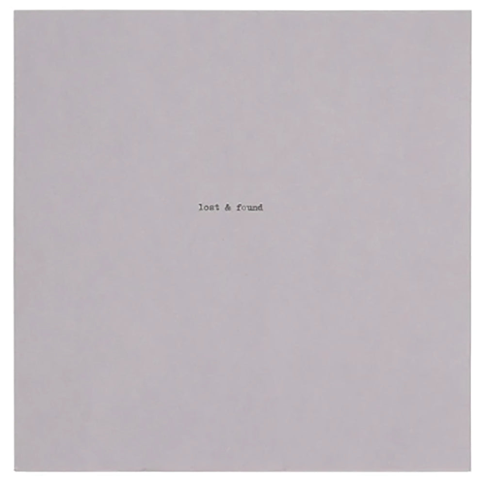 Grey notebook with lost & found text