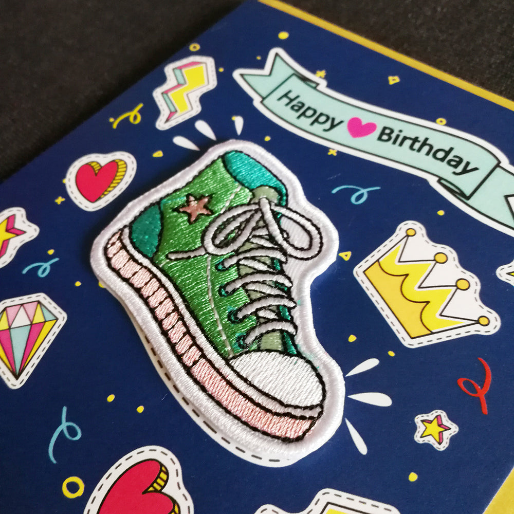 Green trainer patch on birthday card