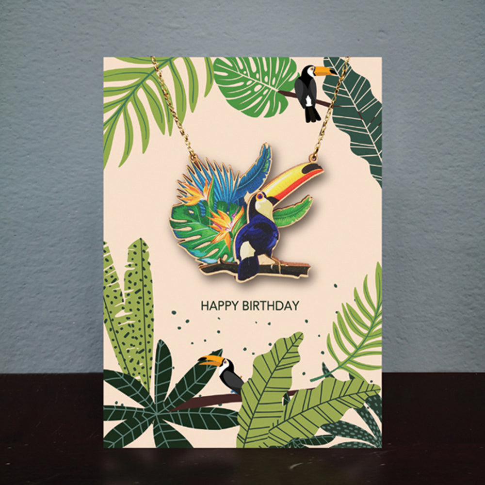 Square Toucan Happy Birthday card with toucan necklace.