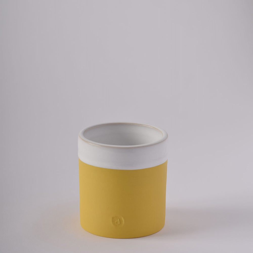 Square yellow ceramic cup